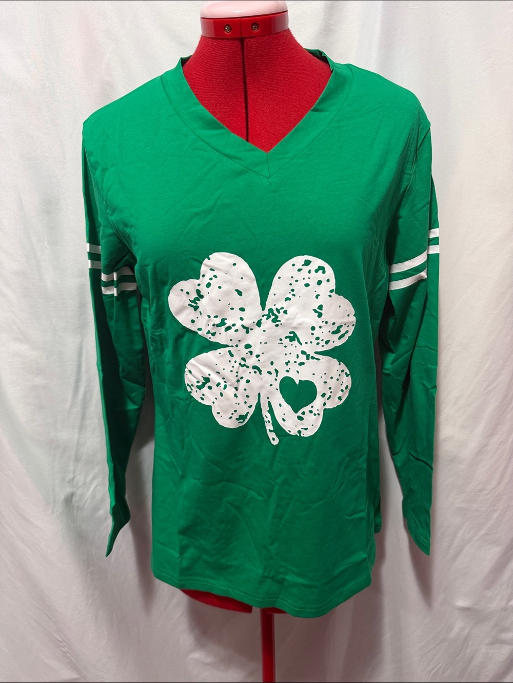 Green Long-Sleeve V-Neck Top with White Shamrock Graphic